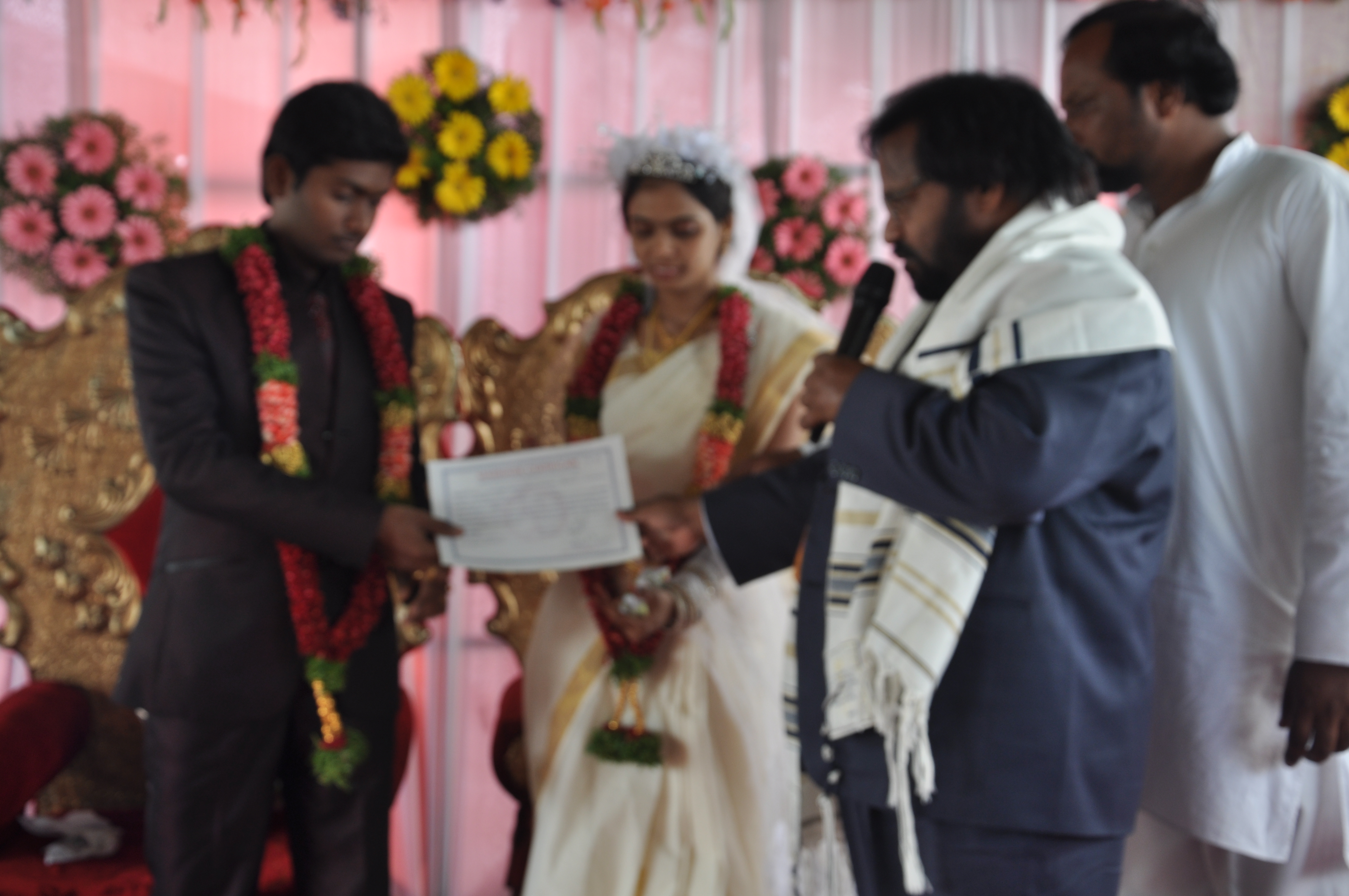 Brother Isaac officiating a Christian wedding ceremony