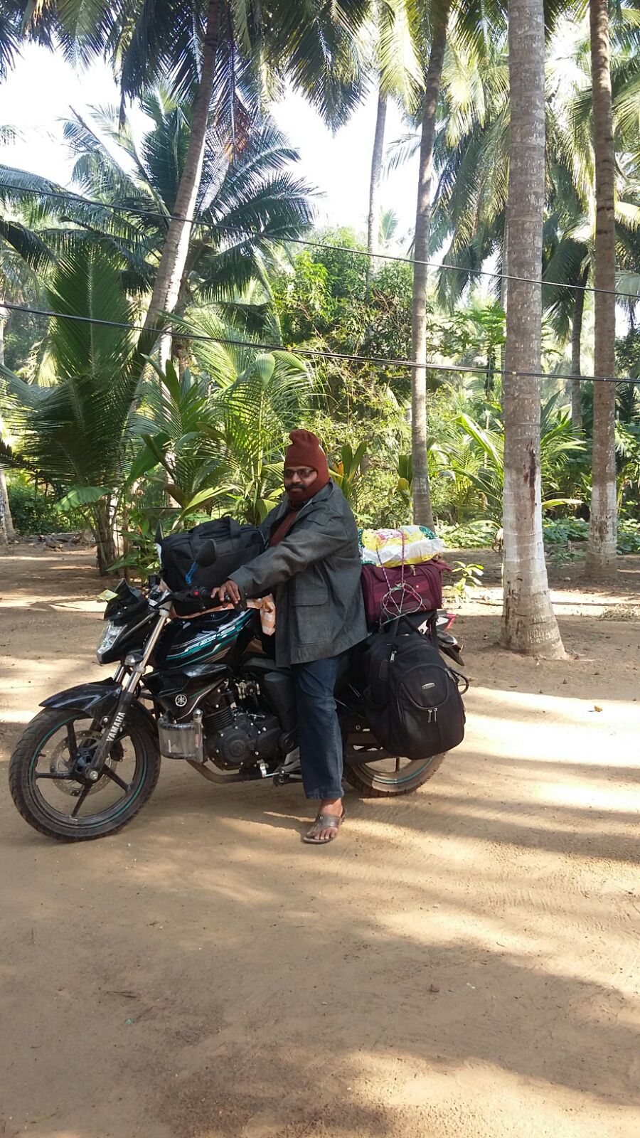 Brother Isaac on his Motorcycle distributing literature
