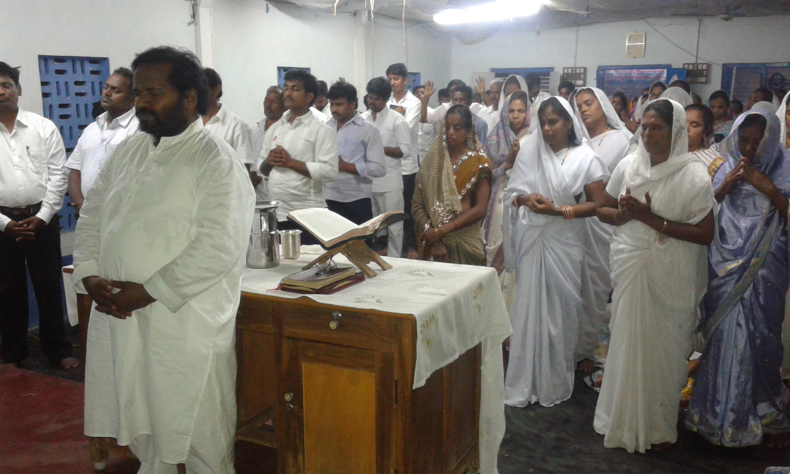 Congregational prayer gathering inside the church