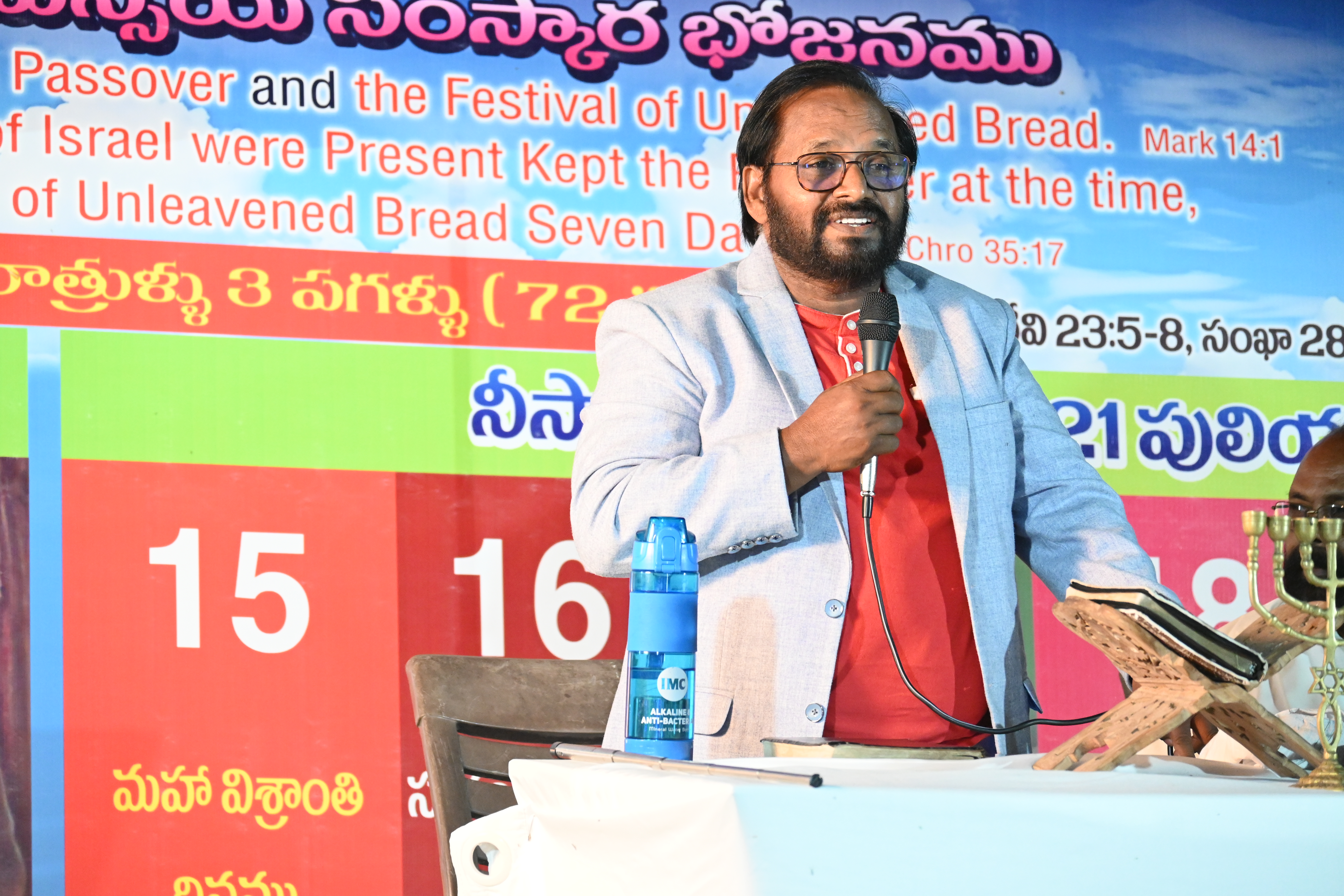 Brother Isaac preaching in the annual festivals