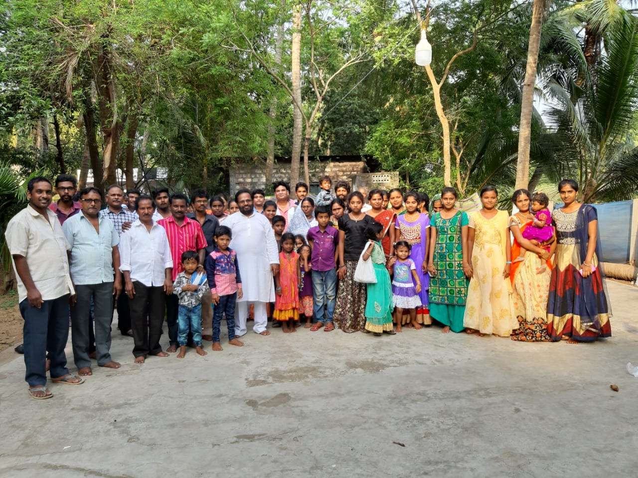 Brother Isaac E. Kusuma with Congregation Members